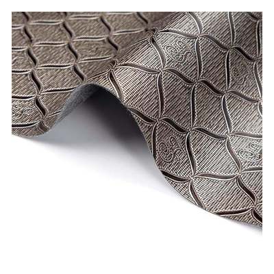 Χονδρικές πωλήσεις σε μπόλικο χώρο PVC φωτεινό γεωμετρικό μοτίβο Τεχνητό συνθετικό δέρμα συσκευασία πορτοφόλι κουτί σημειωματάριο πλαστό δερμάτινο ύφασμα